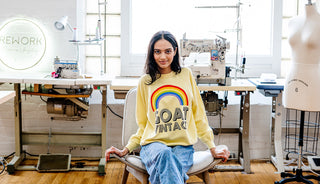 model wearing yellow goat vintage branded sweatshirt